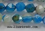 CNG6524 15.5 inches 6mm faceted nuggets line agate beads