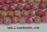 CNG7420 15.5 inches 6mm faceted nuggets rhodochrosite beads