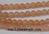 CPE02 15.5 inches 6mm round peach stone beads wholesale