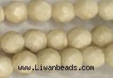 CRJ626 15.5 inches 4mmm faceted round white fossil jasper beads