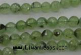 CRU152 15.5 inches 8mm faceted round green rutilated quartz beads