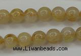 CRU551 15.5 inches 6mm round golden rutilated quartz beads