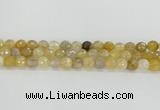 CRU668 15.5 inches 8mm faceted round golden rutilated quartz beads