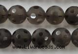 CSQ254 15.5 inches 14mm carved round matte smoky quartz beads