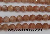 CSS502 15.5 inches 7mm faceted round natural golden sunstone beads