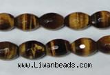 CTE207 15.5 inches 8*10mm faceted rice yellow tiger eye beads