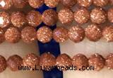 CTG1190 15.5 inches 3mm faceted round goldstone beads wholesale