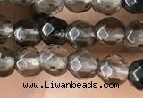 CTG2506 15.5 inches 4mm faceted round smoky quartz beads