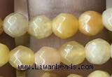 CTG2517 15.5 inches 4mm faceted round yellow jade beads