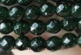 CTG3591 15.5 inches 4mm faceted round green goldstone beads