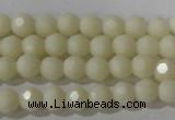 CTU1440 15.5 inches 4mm faceted round synthetic turquoise beads