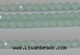 CTU2571 15.5 inches 4mm faceted round synthetic turquoise beads