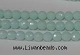 CTU2572 15.5 inches 6mm faceted round synthetic turquoise beads