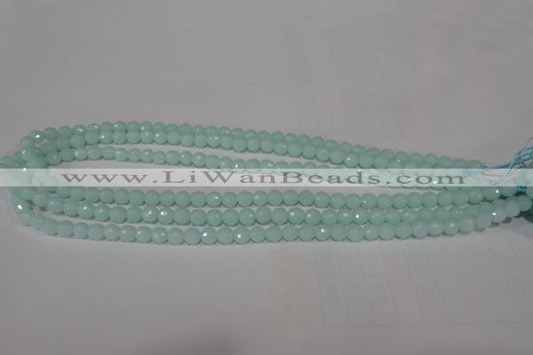 CTU2572 15.5 inches 6mm faceted round synthetic turquoise beads