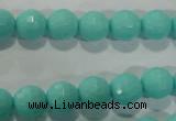 CTU2780 15.5 inches 4mm faceted round synthetic turquoise beads