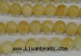 CYJ161 15.5 inches 8mm round yellow jade beads wholesale