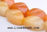 CYJ40 10*14mm twisted rice yellow jade gemstone beads Wholesale