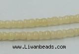 CYJ63 15.5 inches 6*7mm vase-shaped yellow jade gemstone beads wholesale