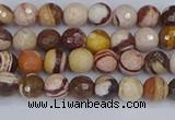 CZJ278 15.5 inches 4mm faceted round zebra jasper beads