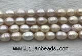 FWP206 15 inches 10mm - 11mm rice white freshwater pearl strands