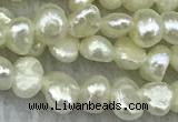 FWP231 14.5 inches 3mm - 4mm baroque white freshwater pearl strands