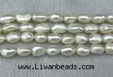 FWP285 15 inches 9mm - 10mm baroque white freshwater pearl strands