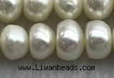 FWP323 15 inches 7mm - 8mm button white freshwater pearl strands