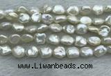 FWP352 15 inches 6mm - 7mm baroque white freshwater pearl strands